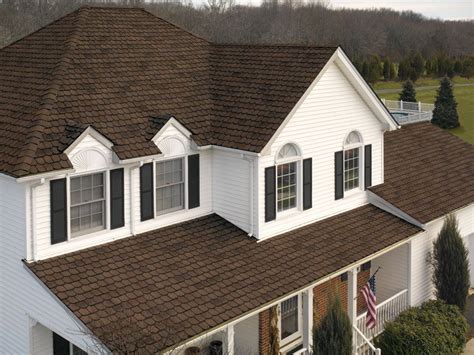 white house brown metal roof|white house with brown shutters.